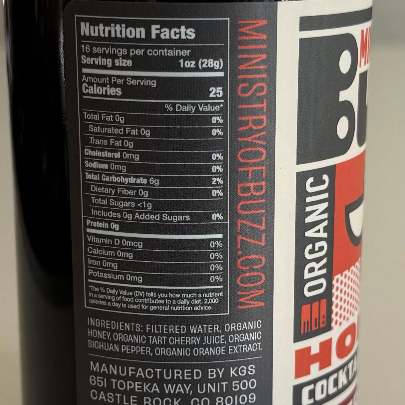 Close-up of a bottle label with nutritional facts and branding details.